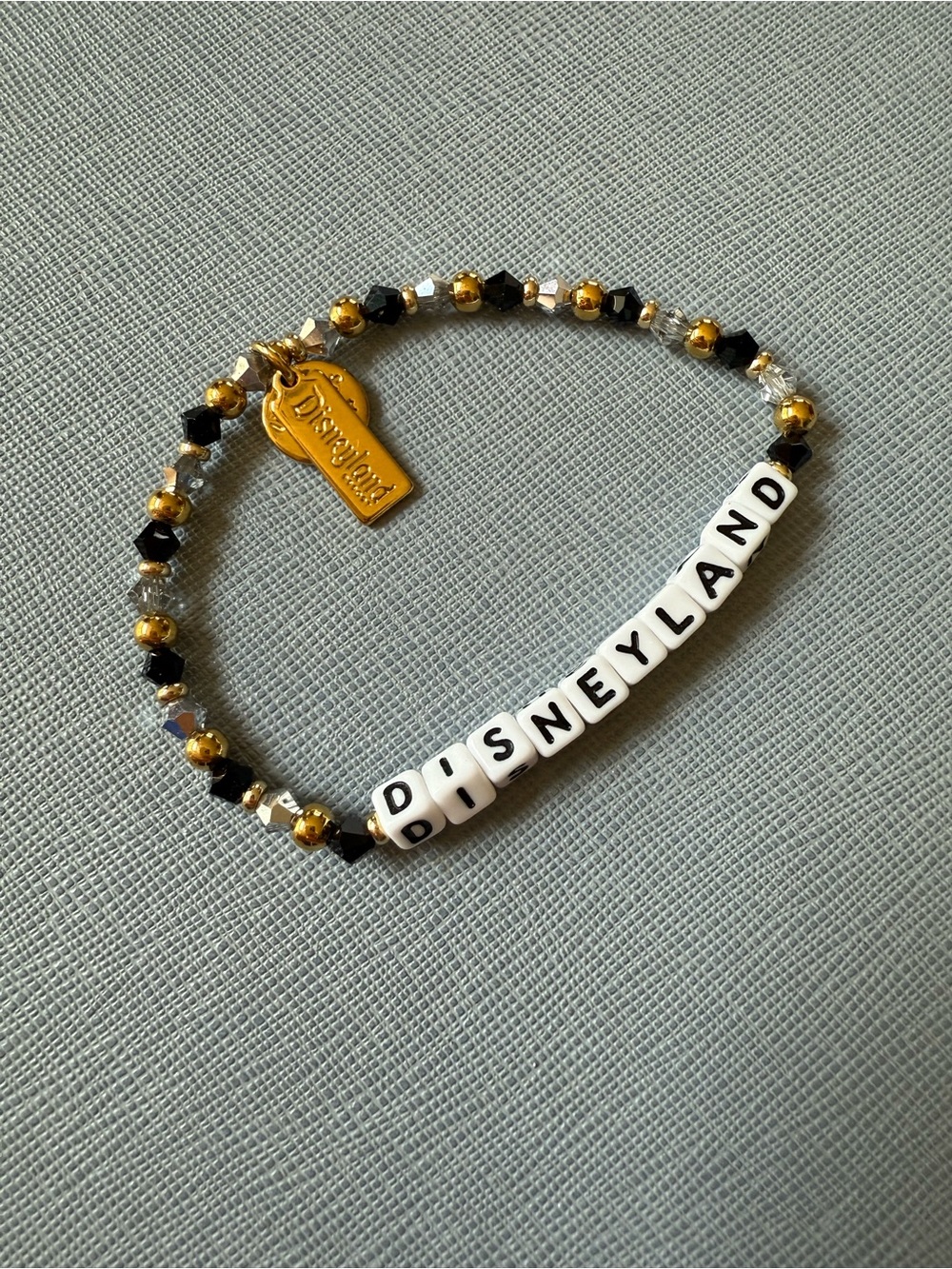Little Words Project Disneyland Beaded Letter Bracelet in Black, Gold & White